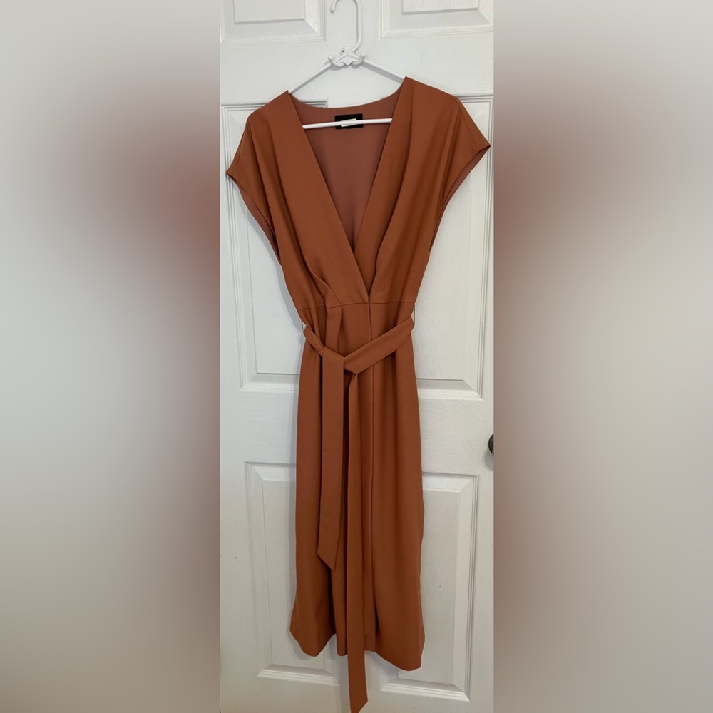 Beautiful, lite material, non-see through dress, ties at hip.